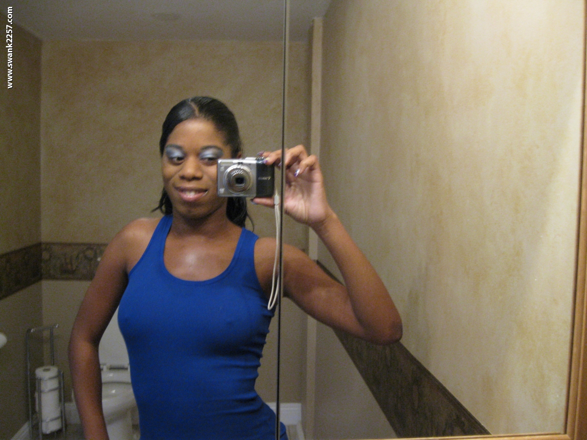 Ebony amateur takes nude selfies in a bathroom mirror during solo action  